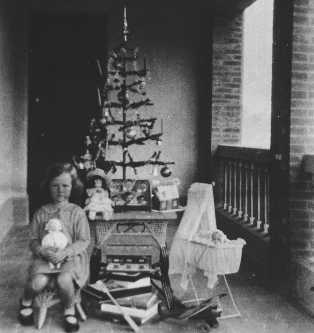 Christmas morning under the Christmas tree, ca. 1935
