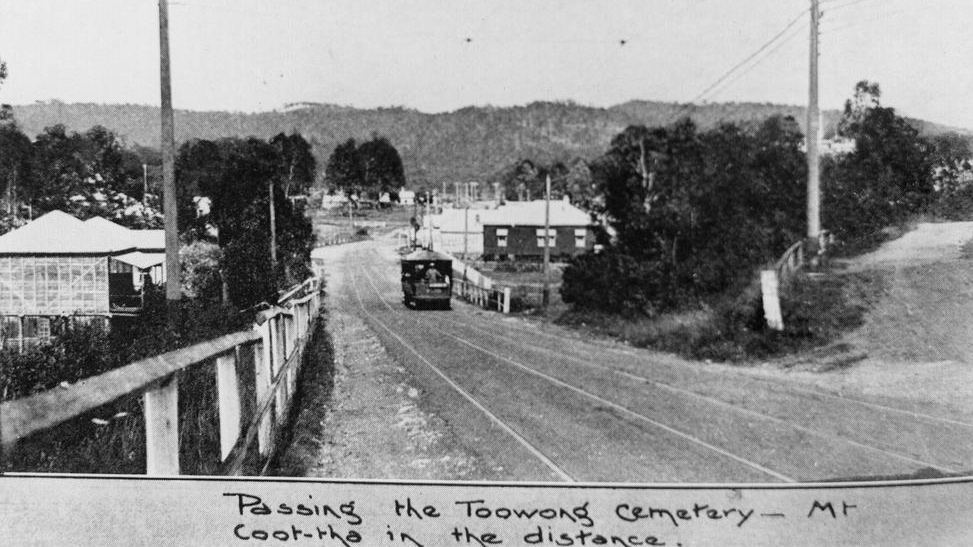 Tram passing the Toowong Cemetery with Mt Coot‑tha in the distance, Queensland, 1921